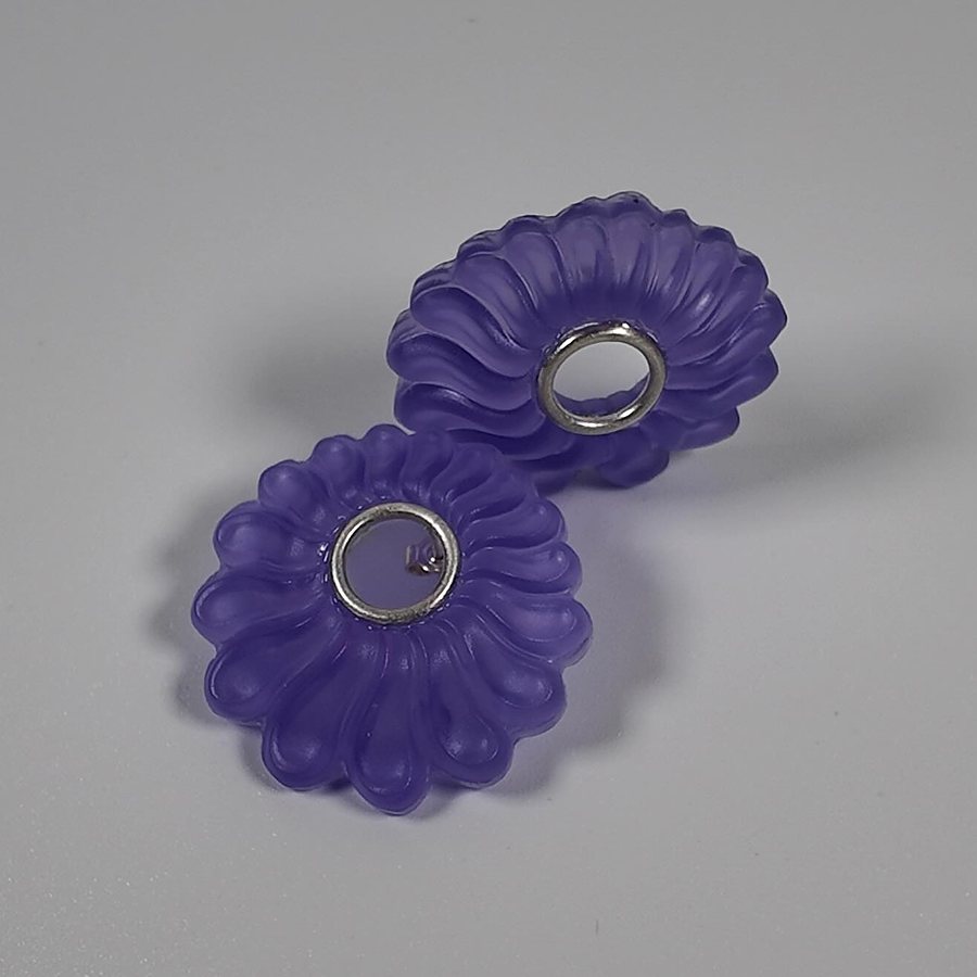 Pair of lilac frosted acrylic flower-shaped stud earrings with silver rings