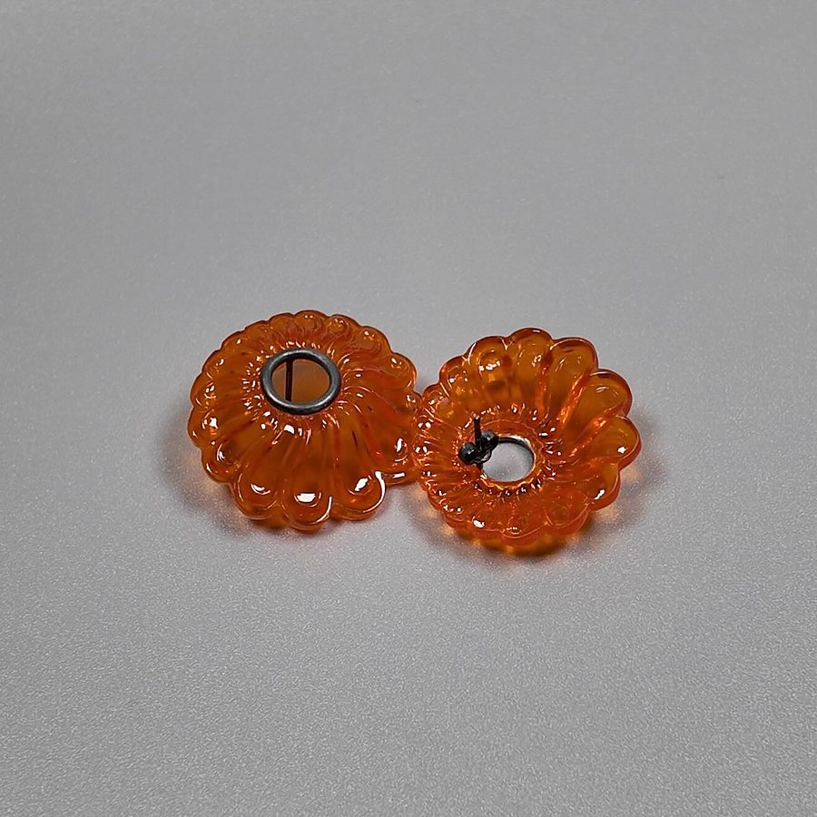 Pair of orange acrylic flower-shaped stud earrings with oxidized silver rings